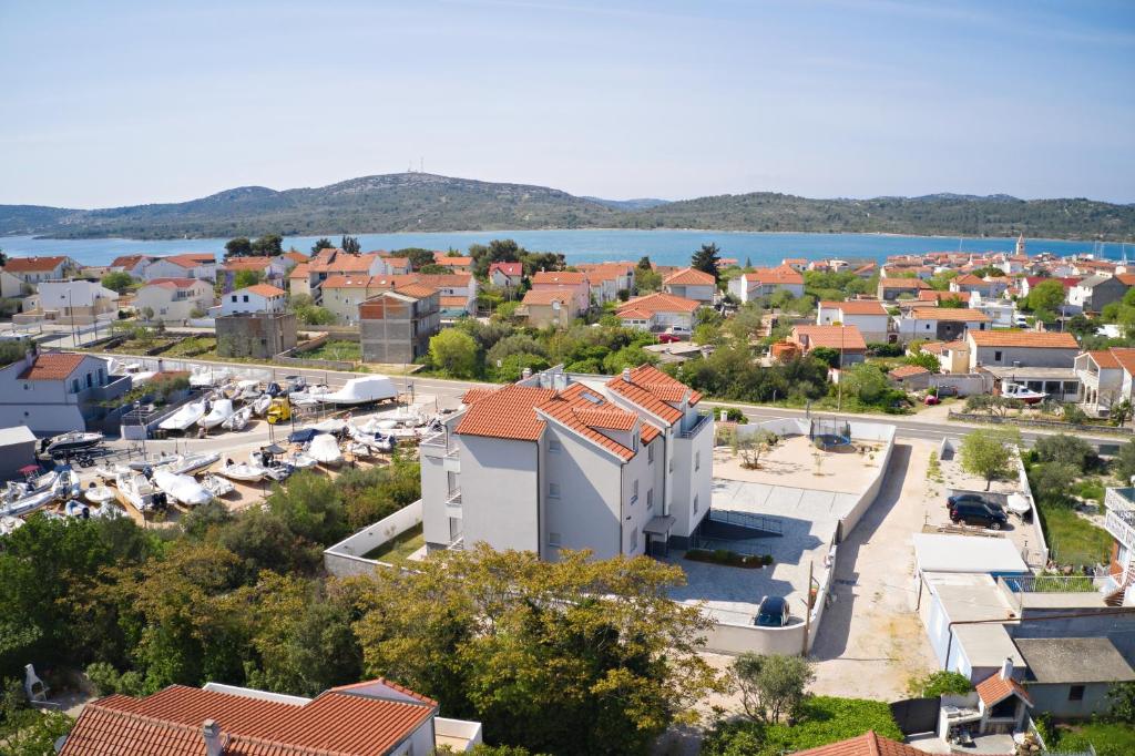 Family friendly apartments with a swimming pool Pirovac, Sibenik - 18998 photo 1