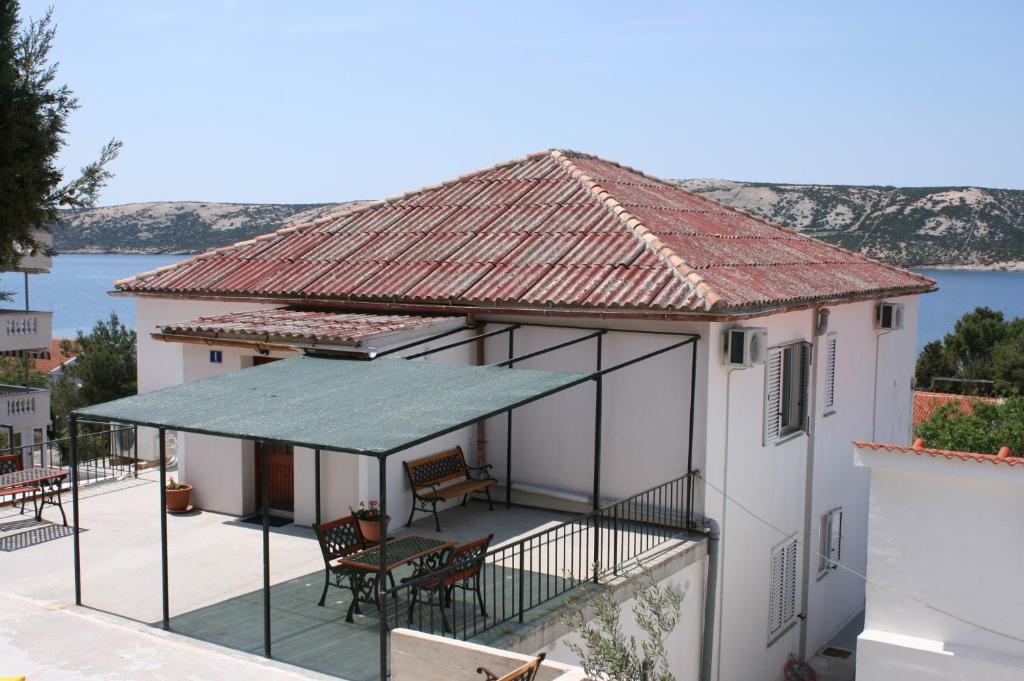 Apartments and rooms by the sea Stara Novalja, Pag - 6303 photo 1