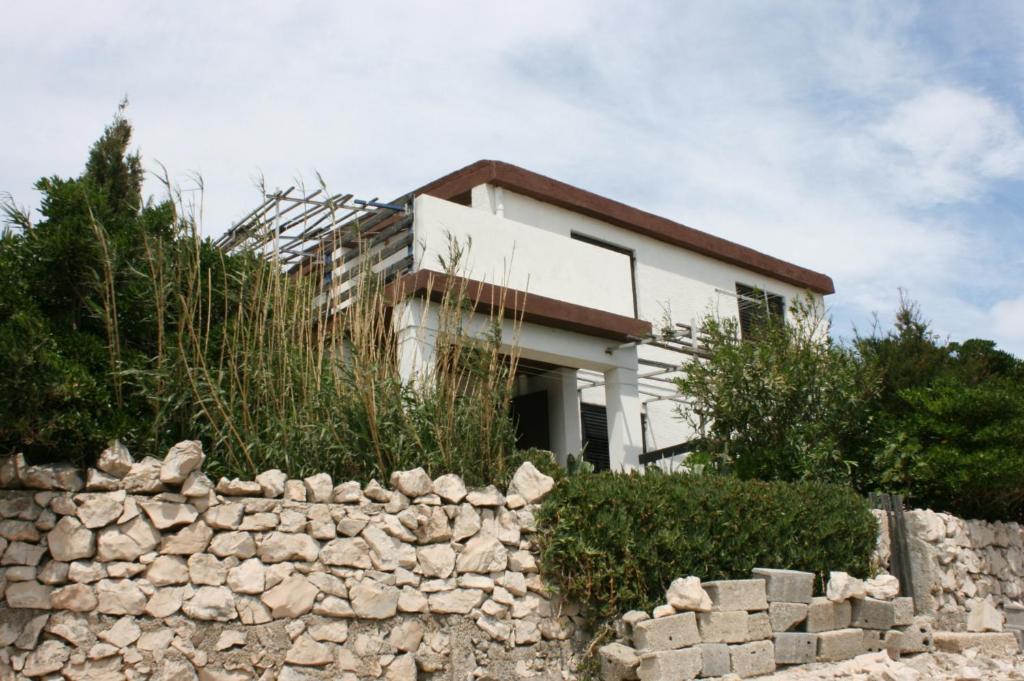 Apartments with a parking space Cove Smokvica, Pag - 6314 photo 1