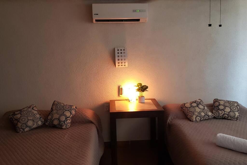 Departamento GRANDE con 2 recamaras con aire 5 camas wifi 115mb, cocina .Cochera techada, #4 photo 4