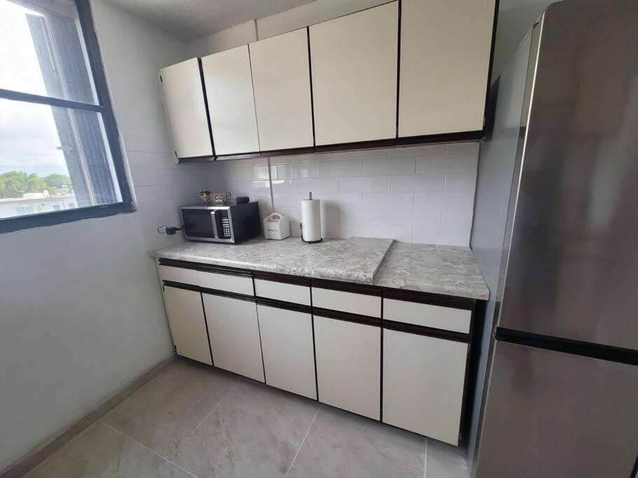 Modern 3 bedroom condo with pool &1 block to beach photo 2