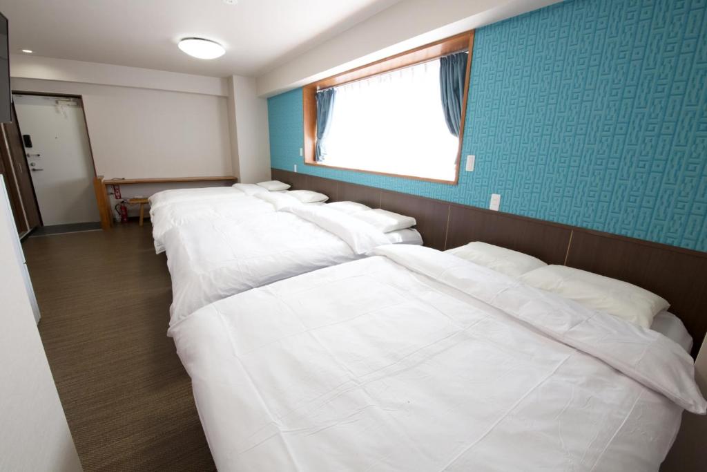 TOMMY CONDOMINIUM WAKASA 202 photo 1
