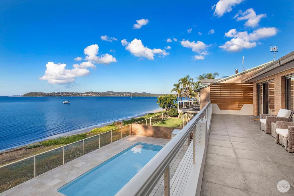 Seaside Sanctuary - Waterfront Luxury Home with Heated Pool