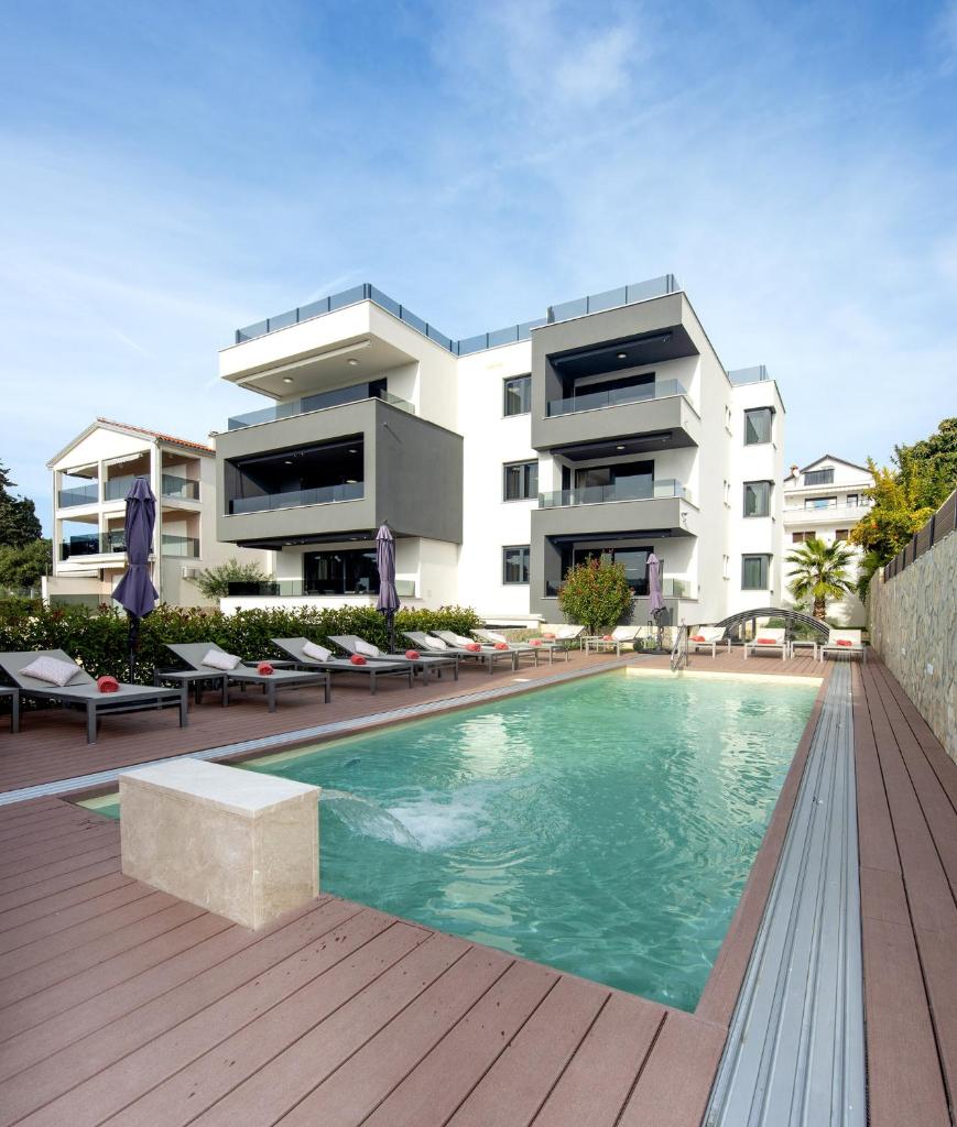 Family friendly apartments with a swimming pool Sveti Filip i Jakov, Biograd - 19325 photo 1