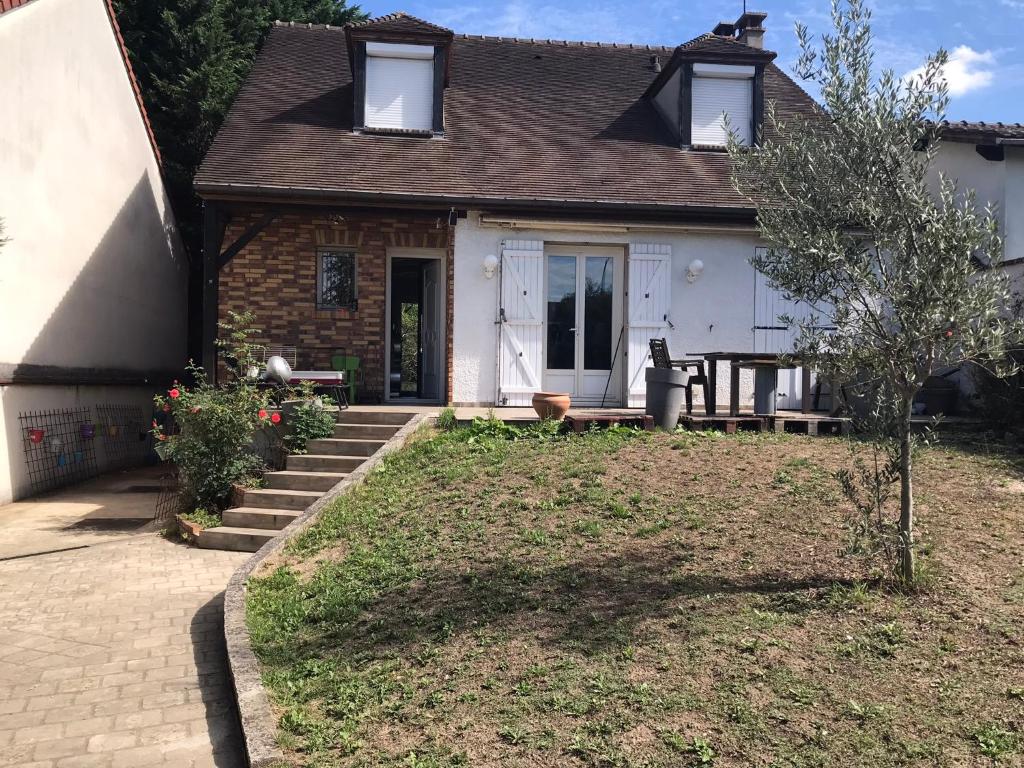 Appartement dans une maison proche de Paris et Disneyland
