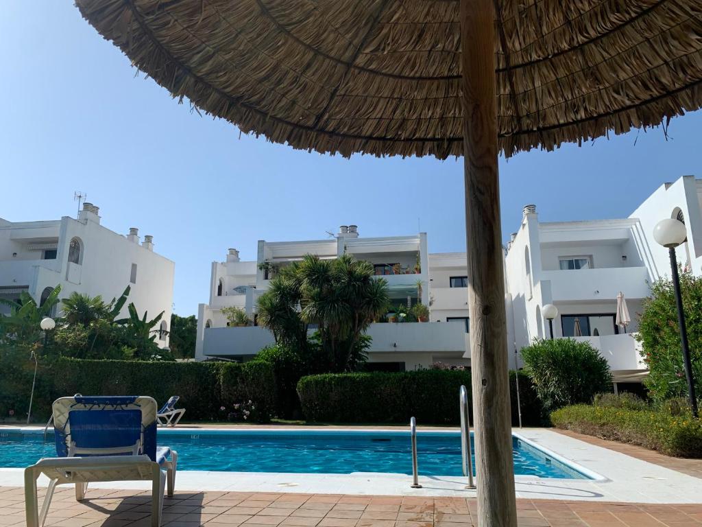 Sotogrande Duplex near Polo, 2 terraces, 2 pools, full south, 7' drive to beaches and Port, 4 people photo 1
