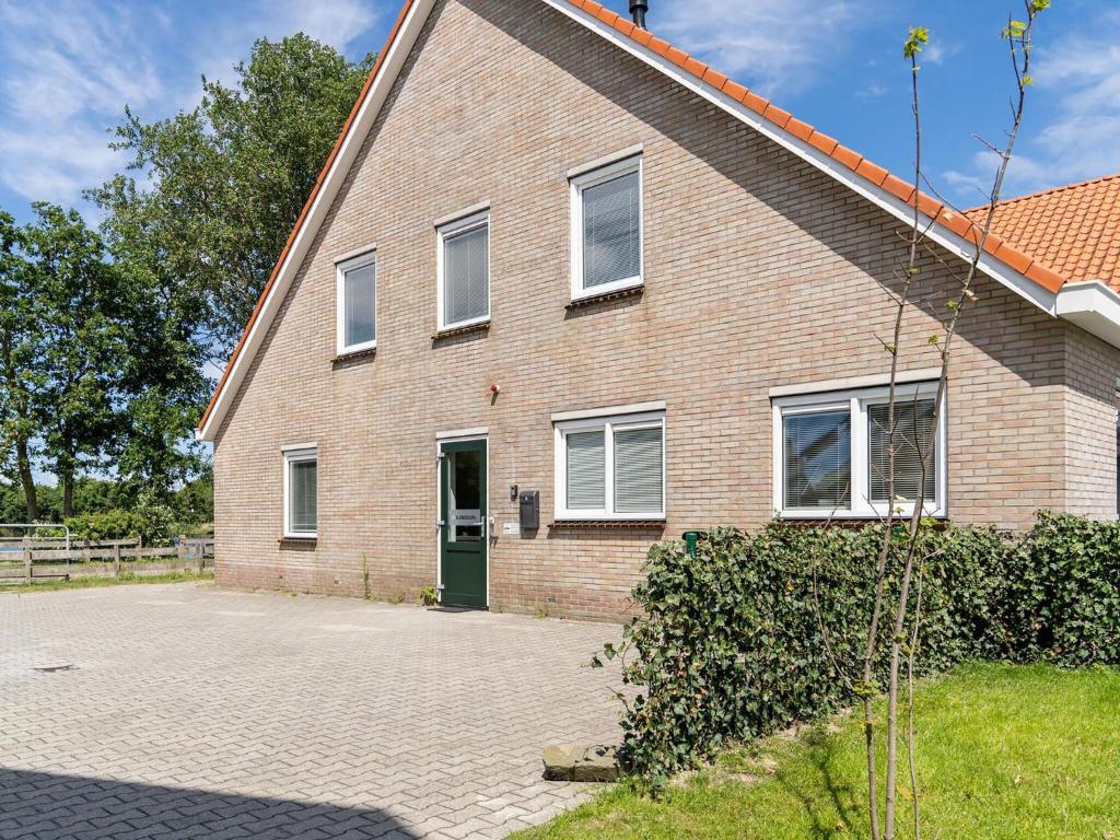 Modern group house in Nes with a beautiful garden photo 1