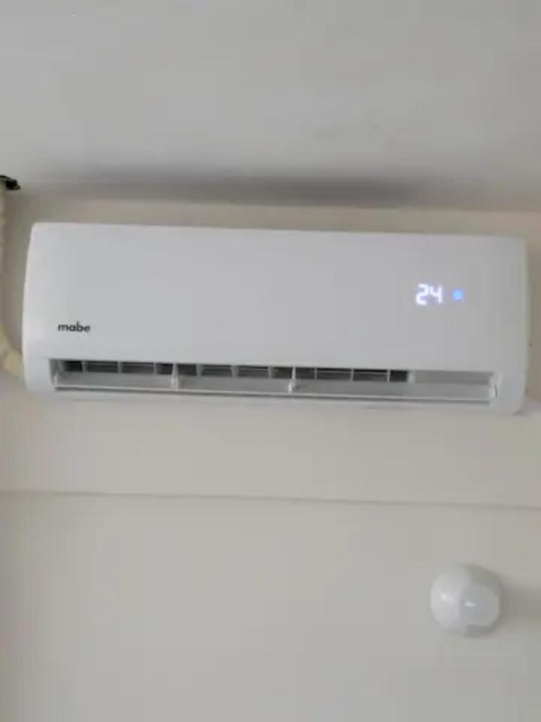 Bonito Departamento con 2 camas con clima, parking, wifi 110mb, ,cocineta, 8 photo 1