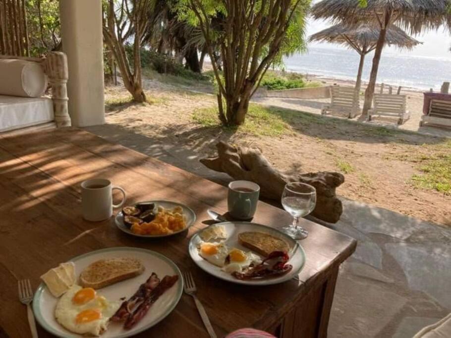 Fantastic beach front cottage with shared pool photo 1