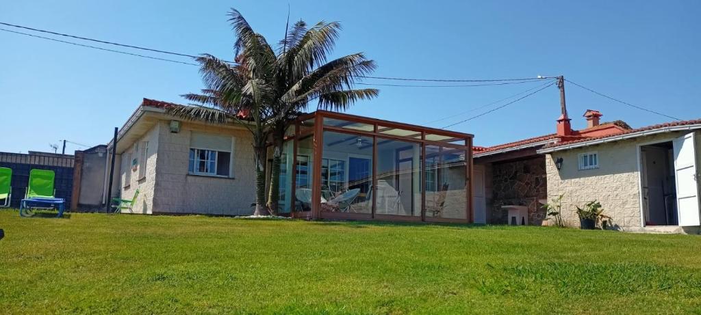 CASA EN PLAYA DE RAZO CON JARDIN Y VISTAS AL MAR photo 1