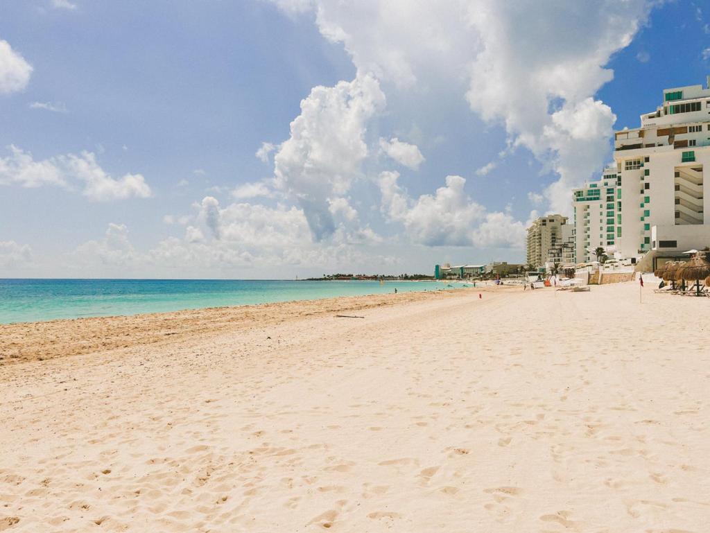 Cancun Plaza Condo Ocean front - Tap to explore photos