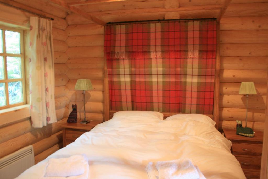 BCC Loch Ness Log Cabins - Tap to explore photos