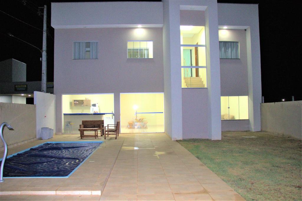 Sobrado espaçoso com piscina com ar na suite photo 1