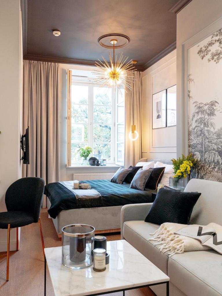 Warsaw Story by StayLab Room Type - Superior studio with king size bed and old town view Warsaw Story by StayLab Room Type - Superior studio with king size bed and old town view