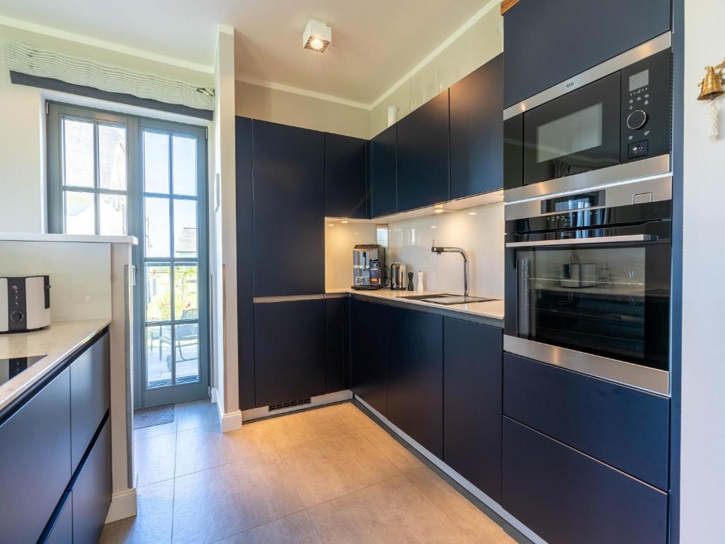 Reetland am Meer - Luxus Reetdachvilla mit 3 Schlafzimmern, Sauna und Kamin E27 photo 3