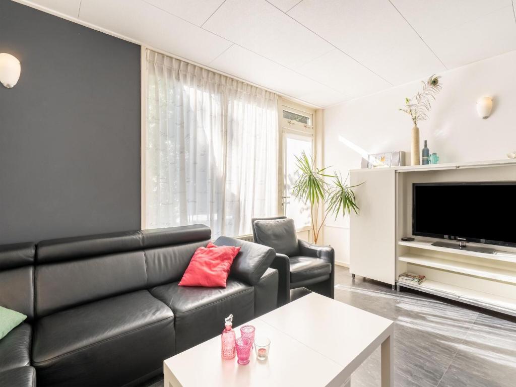 Inviting holiday home in Baarland with terrace photo 1
