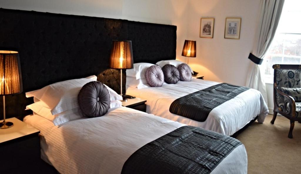 The Georgian Town House Hotel - Tap to explore photos