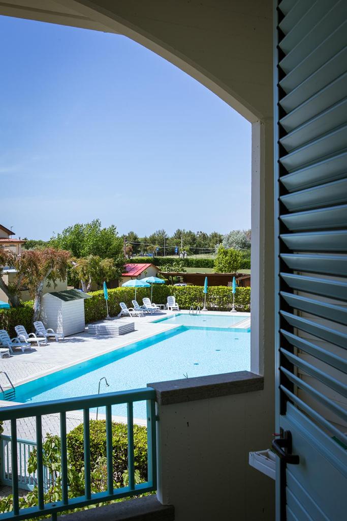 Apartments in residence in Vada with swimming pool 450 meters from the sea photo 1
