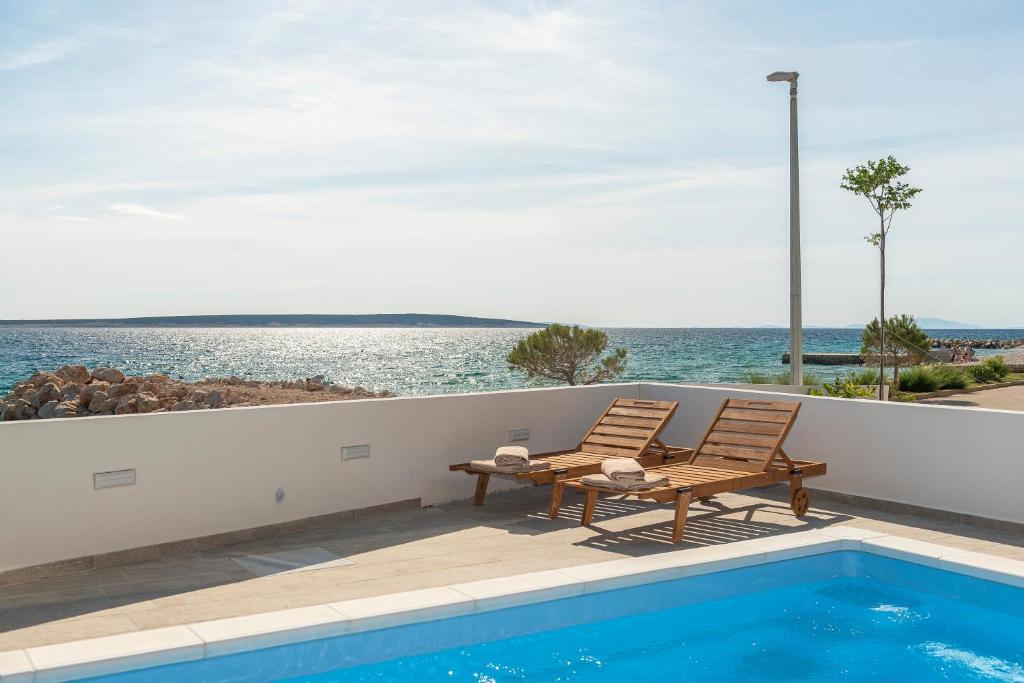 Villa Eni Beachfront apartment with pool photo 1