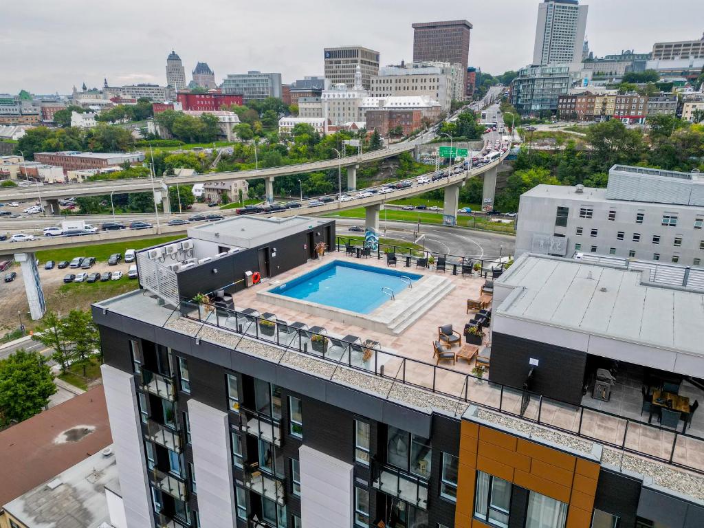 Le 908, suberbe condo neuf avec piscine photo 2