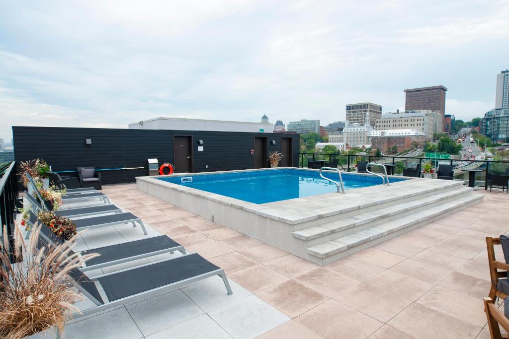 Le 908, suberbe condo neuf avec piscine