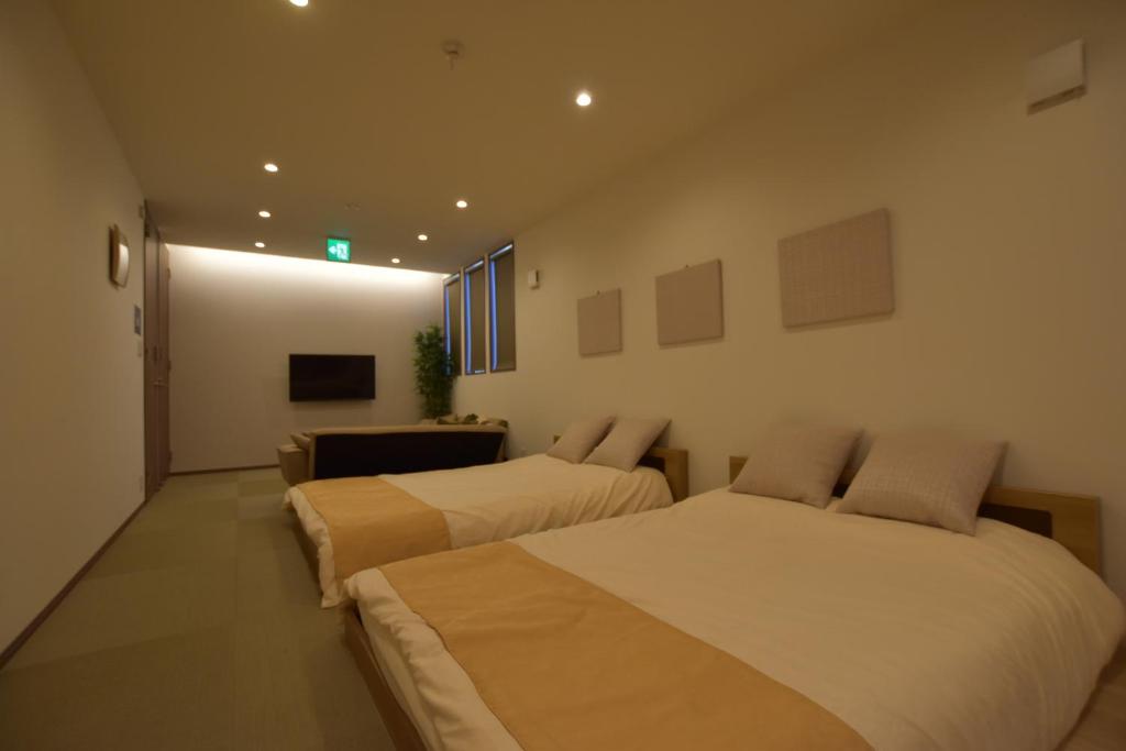 PrimeRoom Beppu Suite - Tap to explore photos