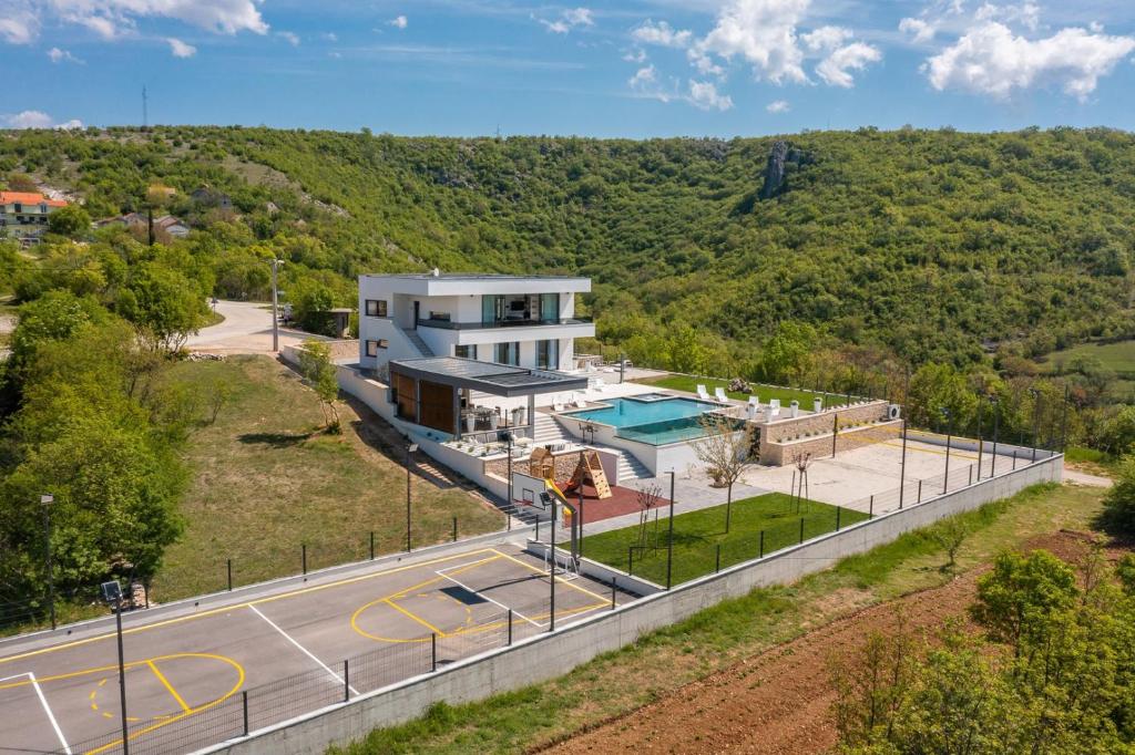 Luxury Villa Arya with 77sqm heated pool, hot-tub, sauna, gym, billiard, playgrounds, 6 bedroom photo 2