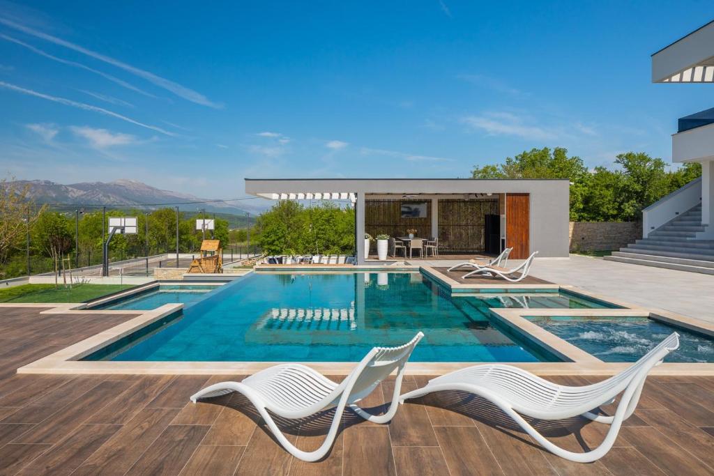 Luxury Villa Arya with 77sqm heated pool, hot-tub, sauna, gym, billiard, playgrounds, 6 bedroom photo 4
