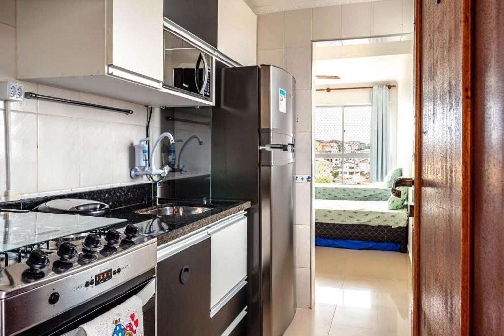 APARTAMENTO, ATÉ 4 PESSOAS,20 Metros da PRAIA do SONHO, PÉ NA AREIA,100 MB WI-FI photo 3