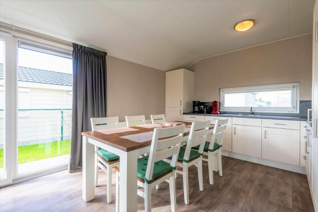 Luxe cottage met fietsen, airco & infrarood cabine photo 3