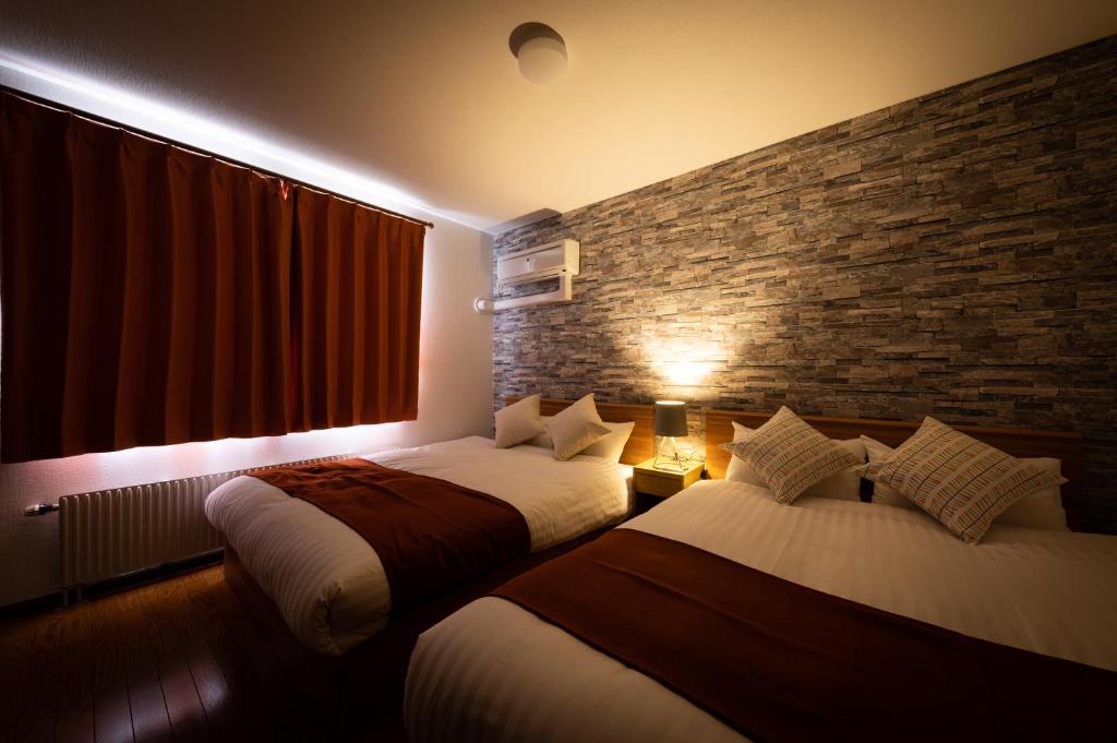 HONGO 11 HOTEL - Tap to explore photos
