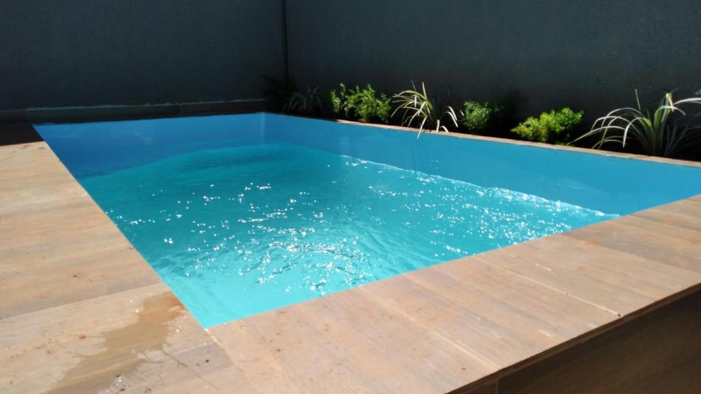 Casa aconchegante com piscina e bem localizada photo 2