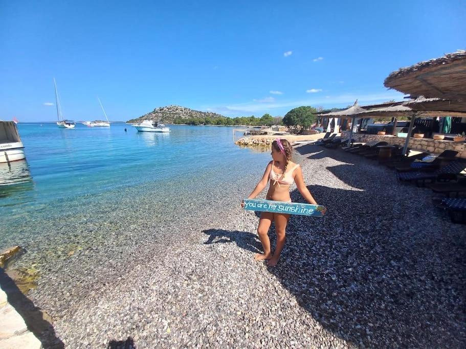 Beach resort BAIN - house Lady, free transport, pool, bbq, breakfast, restaurant, Island of Žut - Kornati photo 1