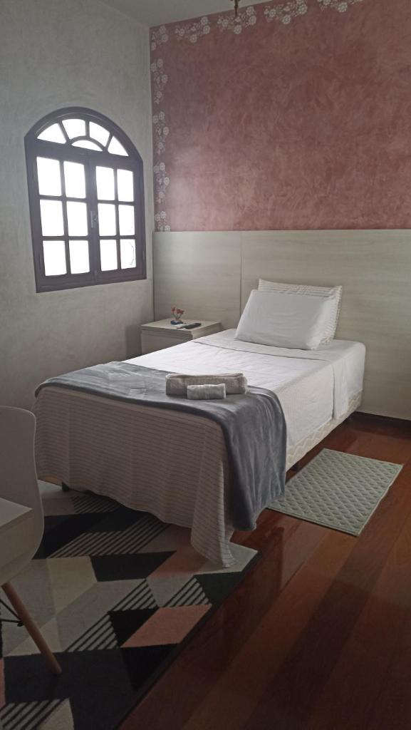 Quarto com ar condicionado em Ubá photo 1