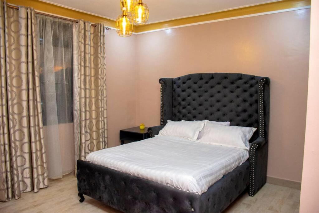 Secure cozy getaway near Kampala business district photo 1