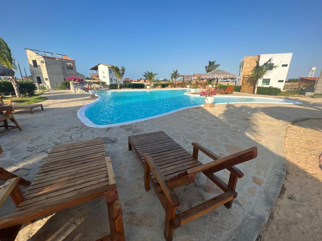 Ap em condomínio com rooftop, jacuzzi, churrasqueira, vista para o mar e uma área de lazer incrível photo 1
