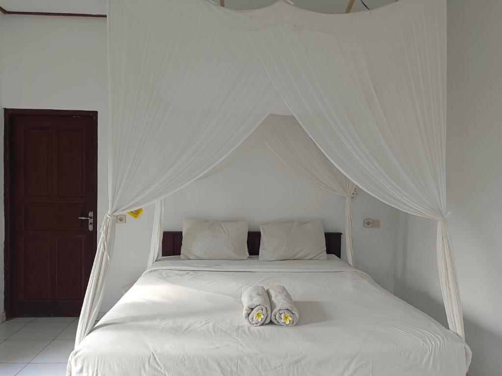 Pasir Putih Cottage - Menjangan photo 2