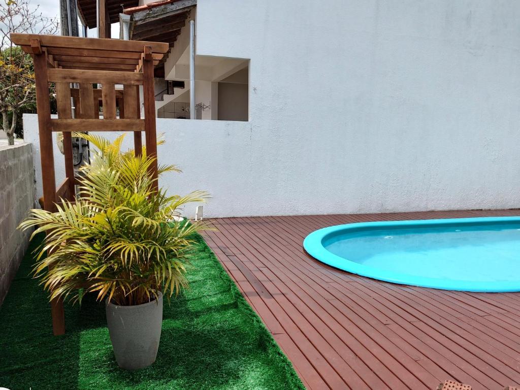casa piscina pinheira -sc photo 1