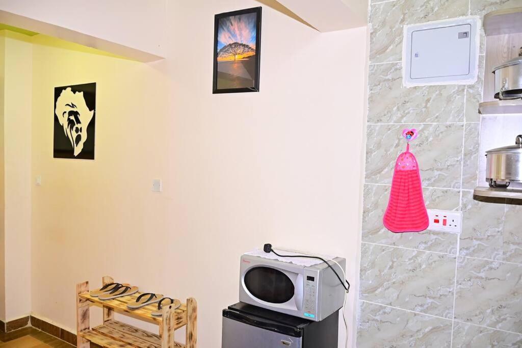 Charming 1-Bedroom Apartment at Alpha Homes - Eastern Bypass photo 2