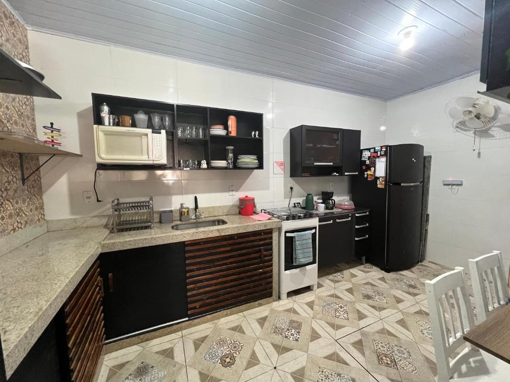 Nosso Repouso Saquarema - Casa inteira com Piscina,churrasqueira privativos, Wi-fi,900m da praia, Tv-Smart. photo 2