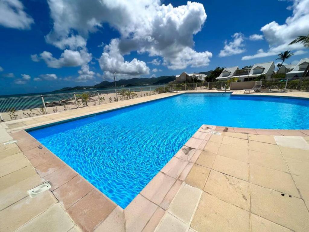 La Plage Bleue feet in the water with swimming pool photo 3