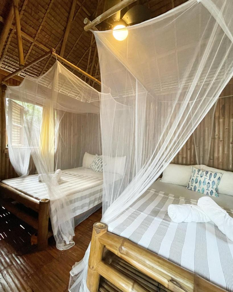 La Tortue Diving Resort Dauin Room Type - Family Room with Sea View