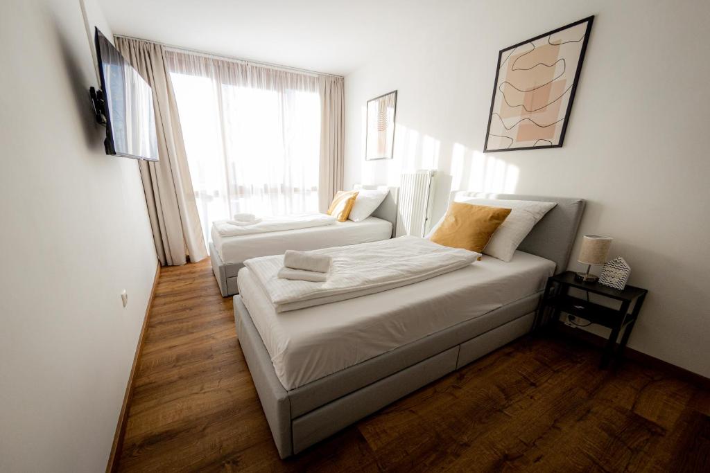 Come4Stay Passau - Holzheim 411 I modern I WLAN I Küche I Parkplatz I SmartTV mit Netflix photo 1