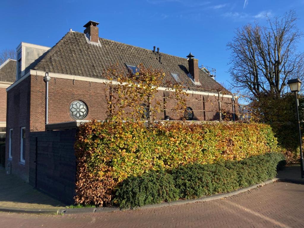 Koetshuis aan het water 3 bedroom villa photo 2