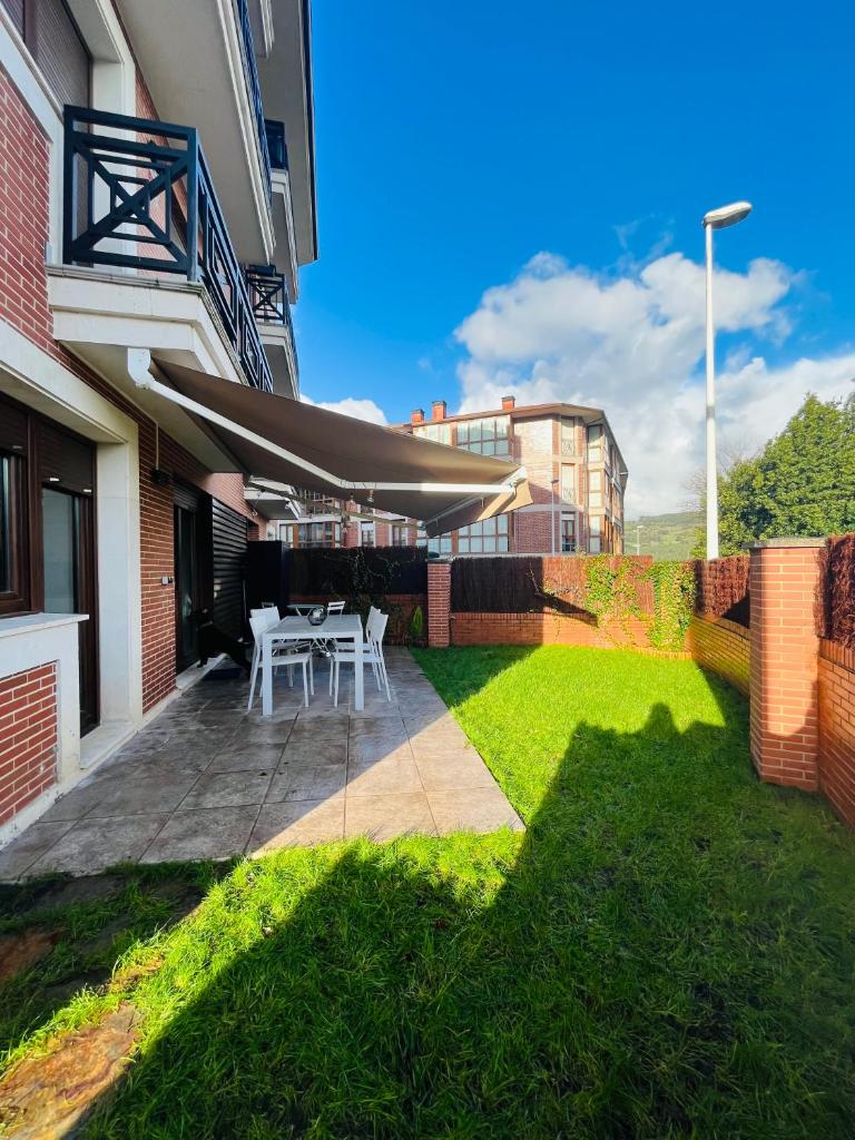 APARTAMENTO con Jardín en Bádames photo 4