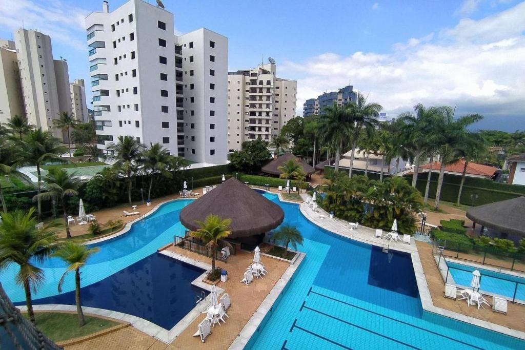 Especial Riviera! Condominio Acqua a 30 seg da praia - tipo resort - apto com ar condicionado, wifi, aceita pet