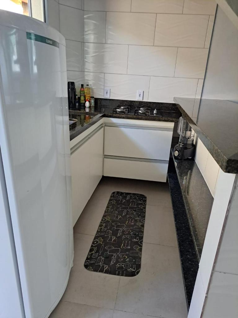 Casa nova com 3 quartos, equipada com Ar Condicionado, TV, Internet e Área de Lazer Completa - Boiçucanga photo 3