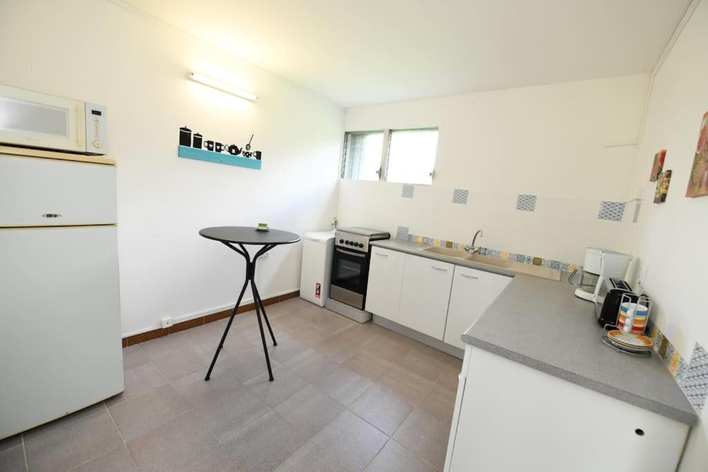 972D4 - Les 2 Palmiers - Bas de villa 60m2 jardin 2000m2 photo 1