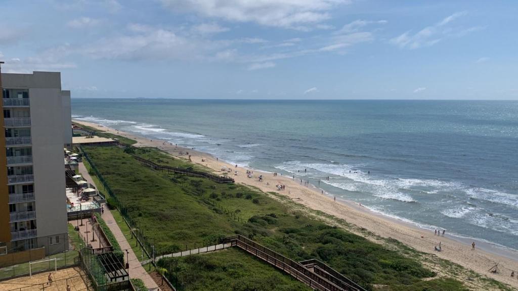Apto beira-mar pé na areia