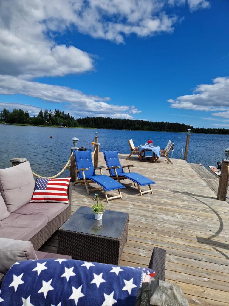 Timber house with private beach and boat including. photo 1